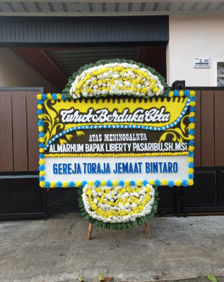 Papan Bunga Duka di Akeguraci